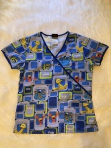 Sesame Street Scrub Top Womens Size XS Blue Shirt Sleeve Shirt - Picture 1 of 7
