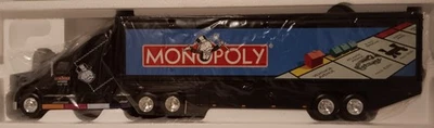Camión Monopoly Hasbro 2000 Game Movers con tablero de juego y piezas Foto 1 de 4