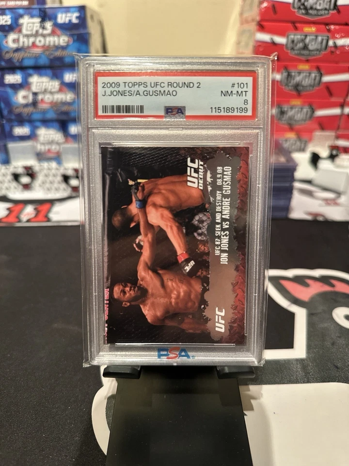 2009 Topps UFC Round 2 - UFC Debut #101 Jon Jones, Andre Gusmao (RC) PSA 8 - Image 1 of 1