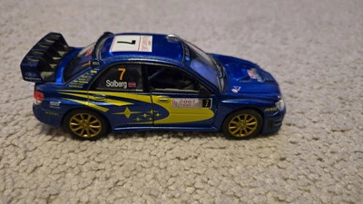 Subaru WRC 2007 escala 1:36 modelo diecast azul por Kinsmart Pull Back Go Foto 1 de 4