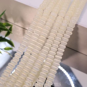 Cuentas espaciadoras rondelle ópalo ojo de gato beige de alta calidad de 3x6 mm para hacer joyas - Imagen 1 de 6