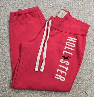 Pantalones deportivos vintage Hollister M rosa logotipo deletreado retro Y2K ropa de salón recortados Foto 1 de 4