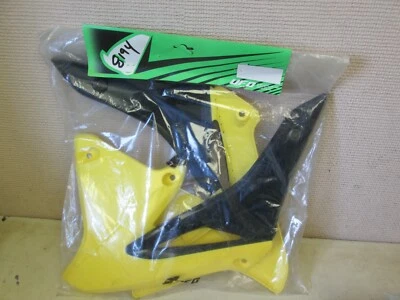 UFO   RAD COVER SET -  SUZUKI RMZ250 2010-2018 / YELLOW + BLACK - Image 1 of 3
