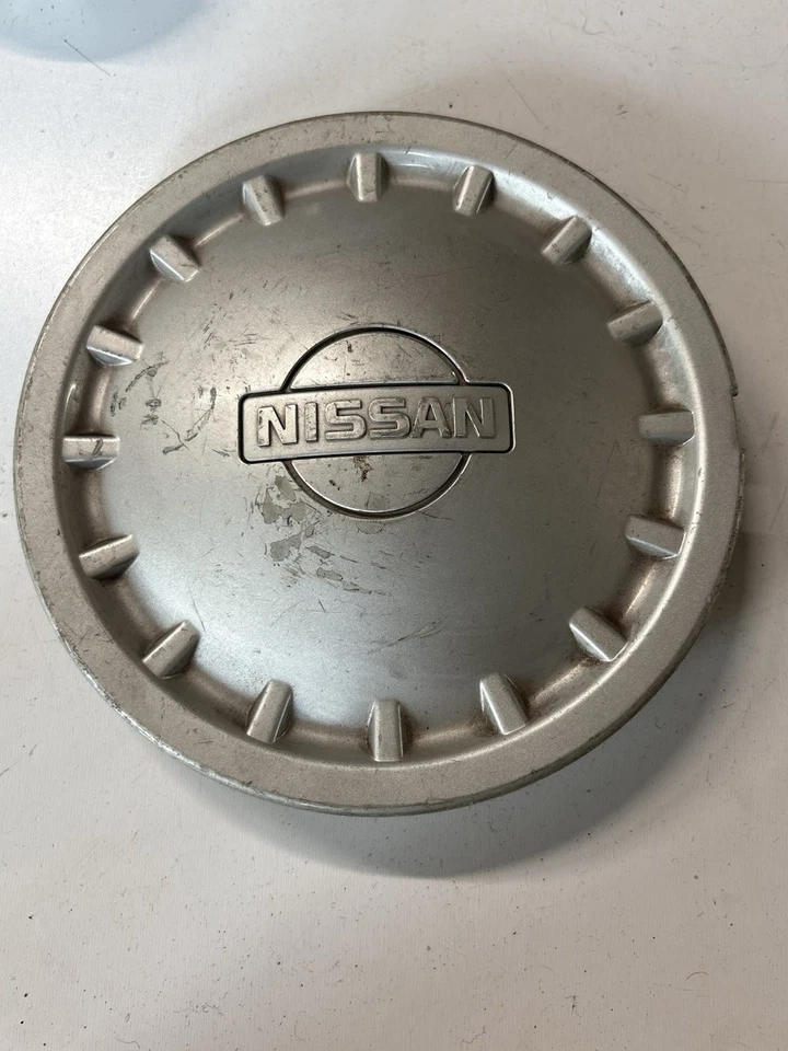 91 92 93 94 95 96 97 98 99 Nissan 200SX NX Sentra 4031550Y00 Tapacubos central OEM Foto 1 de 3