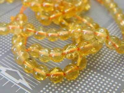 Cuentas de piedras preciosas de cuarzo citrino redondo amarillo profundo de 6 mm - citrino natural redondo de 6 mm Foto 1 de 4