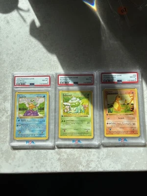 Pokemon 1st Edition Shadowless Base Set Bulbasaur Charmander Squirtle PSA 8 - Image 1 of 2