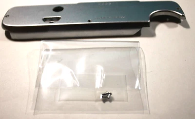 Placa/cubierta inferior del motor Konica FT-1 con tornillos - Piezas de repuesto para cámara Foto 1 de 4