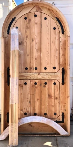 Rustic reclaimed lumber arched door solid wood storybook castle winery speakeasy Cover
