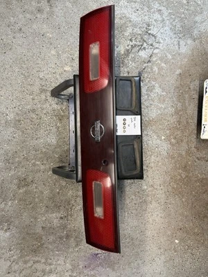 95-98 Nissan 240sx S14 OEM Rear Trunk Lid Tail Light Center Garnish Panel - Image 1 of 4