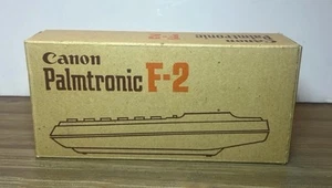 Calculadora científica Canon Palmtronic F-2 de colección con caja, estuche y papeleo - Imagen 1 de 8