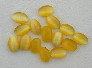 16 - 6x4 6 mm x 4 mm oval gelb Glasfaser Catseye Quarz Kieselsäure Cabochon Edelstein - Bild 1 von 1