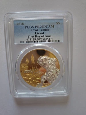 PCGS PR70 2018 DCAM - ¡primer día de emisión! Moneda de plata dorada lagarto de las Islas Cook Foto 1 de 4