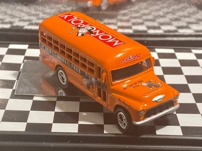 1/64 1956 CHEVROLET GET OUT OF JAIL BUS MONOPOLY ORANGE M23 - Image 1 of 4