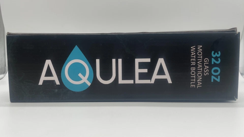 AQUALEA 32 OZ GLASS WATER BOTTLE WITH TIMES TO DRINK WITH PINK SILICONE SLEEVE - Image 1 of 4