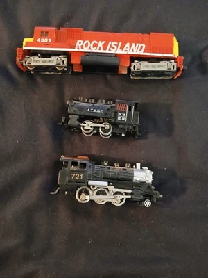 Tyco HO Scale Rock Island Locomotive 4301, at & sf & 821 locomotives 3 total - Image 1 of 4