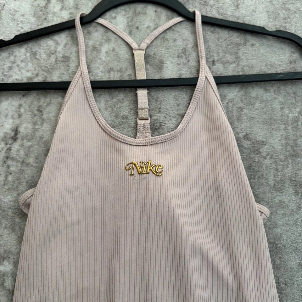 Camiseta sin mangas de entrenamiento para mujer Nike Elastika talla XS rosa dorado logotipo espalda deportiva Foto 1 de 4