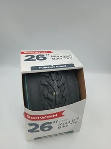 SCHWINN 26"X 1.95" MOUNTAIN BIKE BICYCLE TIRE, PUNCTURE GUARD - Picture 1 of 4