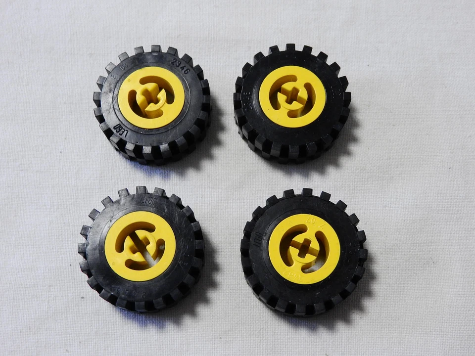 4x LEGO  Reifen 2346 - mit gelber Felge (A229) - Bild 1 von 1