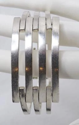 Brazalete O. P. Orlandini UNOAERRE Esterlina Modernista Bisagras Italia 66g Foto 1 de 4