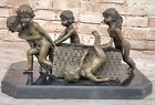 Sculpture en bronze signée R Larche artisanale enfants avec panier en vente