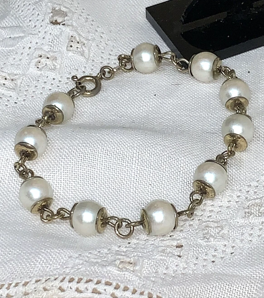 BRACCIALE ANNI 70  IN ARGENTO PL. ORO GIALLO E PERLE DI SINTESI LUNGO CM 19 - Immagine 1 di 4