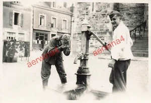 Deutscher Soldat am Brunnen vor Kirche in Ville Villé Frankreich - Bild 1 von 2
