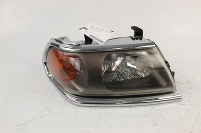 Faro derecho pasajero bisel cromado SOLO PIEZAS 00-04 MONTERO SPORT 22788 Foto 1 de 4