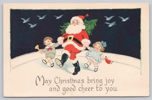 Postal reverso dividido que la Navidad te traiga alegría Santa Claus y los niños - Imagen 1 de 2