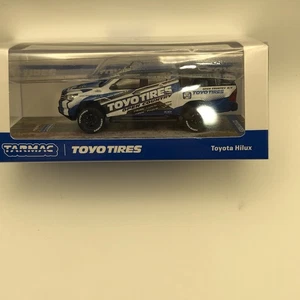 Tarmac Works Toyota Hilux Pickup Truck - 1:64, Toyo Tires (2025 Hobby64) Sealed - Picture 1 of 5