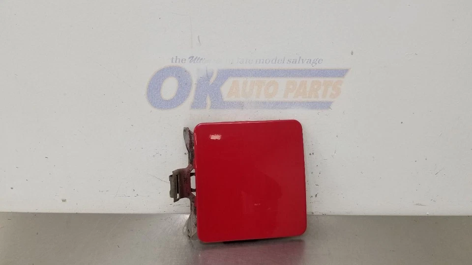 93 GMC TYPHOON FUEL FILLER DOOR GAS LID RED - Image 1 of 4