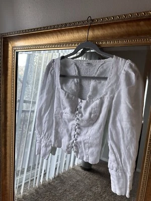 Top de lino con manga globo Reformation Micah en blanco Foto 1 de 4