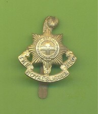 THE ROYAL SUSSEX REGIMENT.BRASS ARMY CAP BADGE