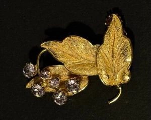 Modeschmuck Brosche mit Blättern goldfarben und 6 Steinen transparent violett - Bild 1 von 4