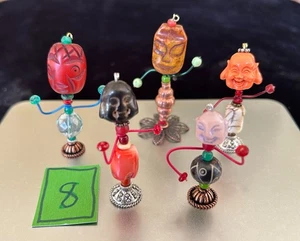 EIN SET MIT FÜNF Mini Perlen Magnet Kreaturen-Buddha/Arhat Steinköpfe - Bild 1 von 6