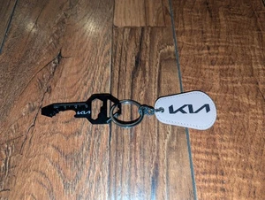 Portachiavi Kia rosa OEM apribottiglie strumento concessionario portachiavi memorabilia - Foto 1 di 2