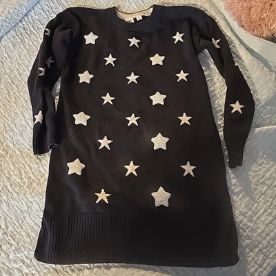 Suéter túnica larga Gap niños niñas lentejuelas negras estrellas blancas talla XL.        P Foto 1 de 4