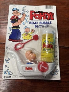Soplador de burbujas de barco Larami Popeye 1984 de colección nuevo en paquete - Imagen 1 de 2