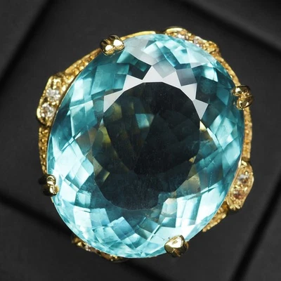 Brillantes anillos enchapados en oro de 24 quilates de plata de ley 925 de 30,70 quilates con topacio azul de Londres Foto 1 de 4