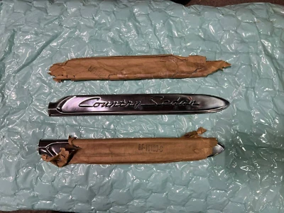 1953 Ford Country Sedan Fender Trim Emblems Left & Right Pair Moldings NOS - Изображение 1 из 2