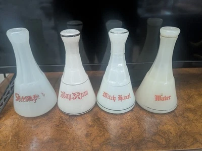 Juego de 4 botellas antiguas de peluquero de vidrio clambroth EW Co Inc Foto 1 de 4