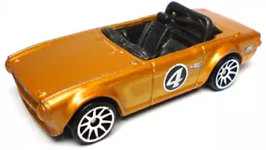 HOT WHEELS TRACK STARS TRIUMPH TR6 #4 ORANGE 1:64 DIECAST 2 5/8" RACE CAR - Picture 1 of 6