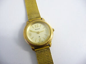 Vintage ladies Accurist dress wrist watch; gold metal case & link bracelet strap