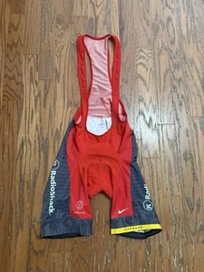 Nike Cycling Bib Shorts Mens XXL Team Radio Shack Live Strong Nissan Padded Bibs - Picture 1 of 11