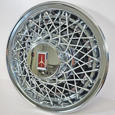 ONE 1980-1984 Oldsmobile 88 98 Custom Cruiser # 4070A tapacubos de cable de 15" # 22504976 Foto 1 de 4