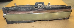 1991-1996 Corvette Front Fog Parking Light Piece, w/Brackets, Left, GM 16515741 - Picture 1 of 3