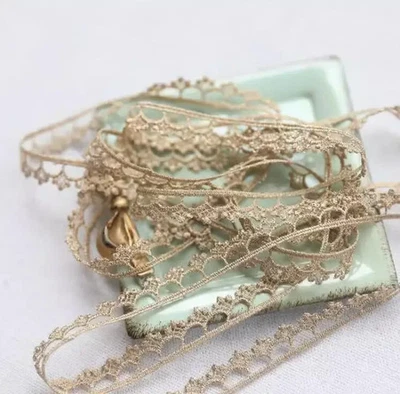 Metallic Gold color lace trim 3/8-inch-wide price per yard - Image 1 of 4