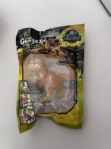 Heroes Of Goo Jit Zu Minis Jurassic World Mini T-Rex Amber Toy COLLECTORS FIGURE - Picture 1 of 2