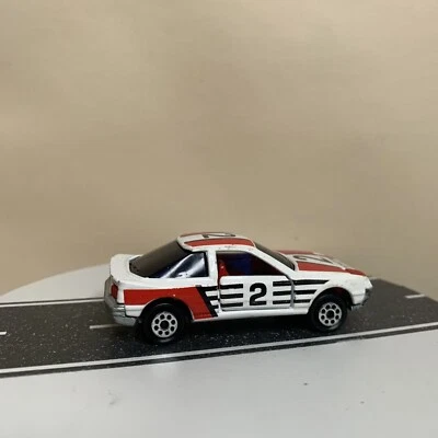Majorette #249 Toyota Celica 2.0GT cupé blanco/negro/rojo librea con logotipo 1:58 casi nuevo Foto 1 de 4