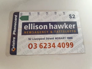 Tarjeta telefónica Australia Telstra $2 Ellison Hawker agencia de noticias y tattslotto 2 agujeros - Imagen 1 de 2