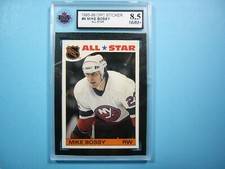 1985/86 O-PEE-CHEE NHL HOCKEY CARD INSERT STICKER 9 MIKE BOSSY KSA 8.5 NMMT+ OPC